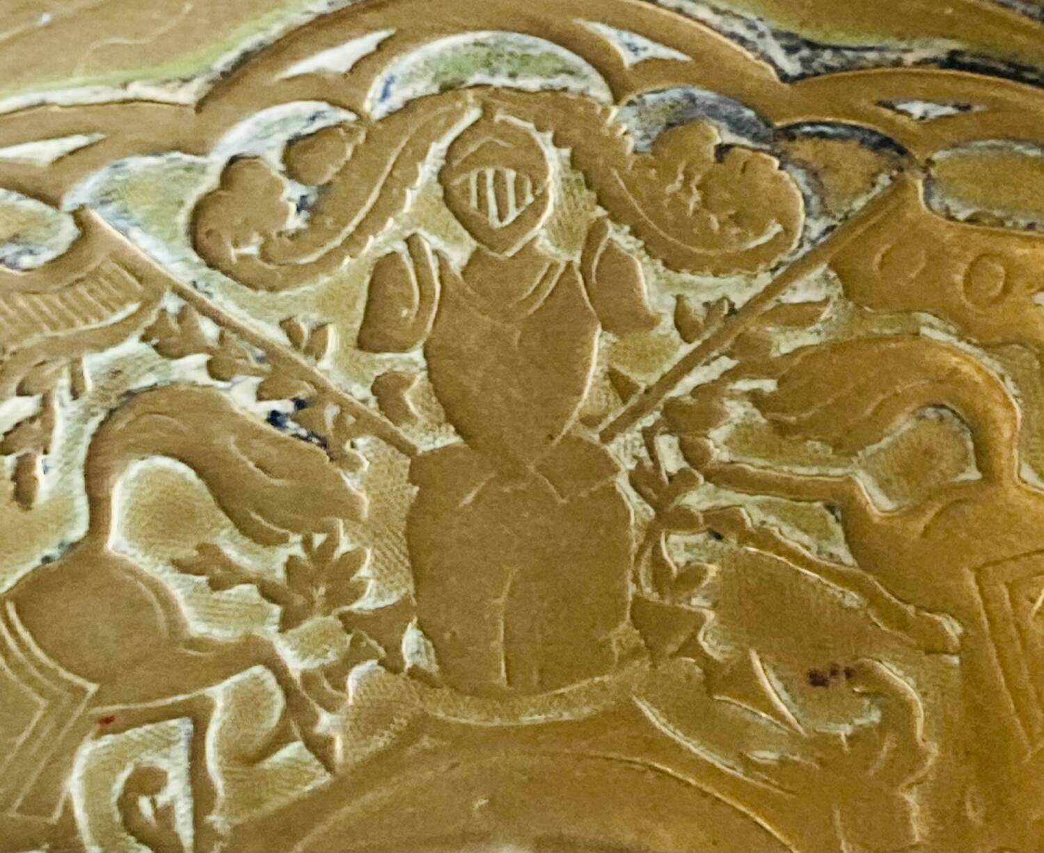 20th century chiseled brass socket candle holder representing Horsemen in armor