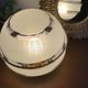 Globe old art deco table lamp in glass and brass support