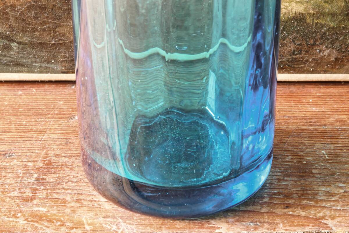 Large blown crystal bottle, twisted, turquoise blue, early 20th century.