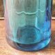 Large blown crystal bottle, twisted, turquoise blue, early 20th century.