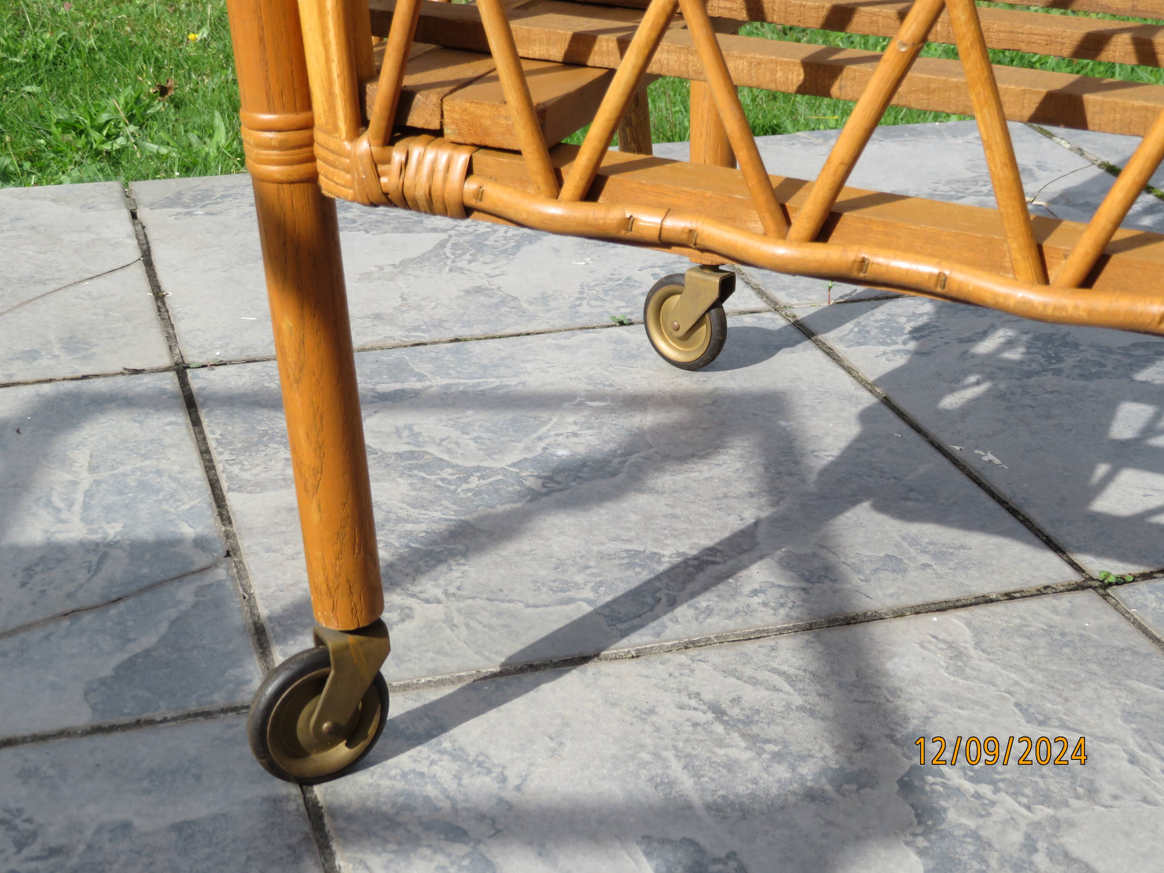 antique rattan children's bed with arrow