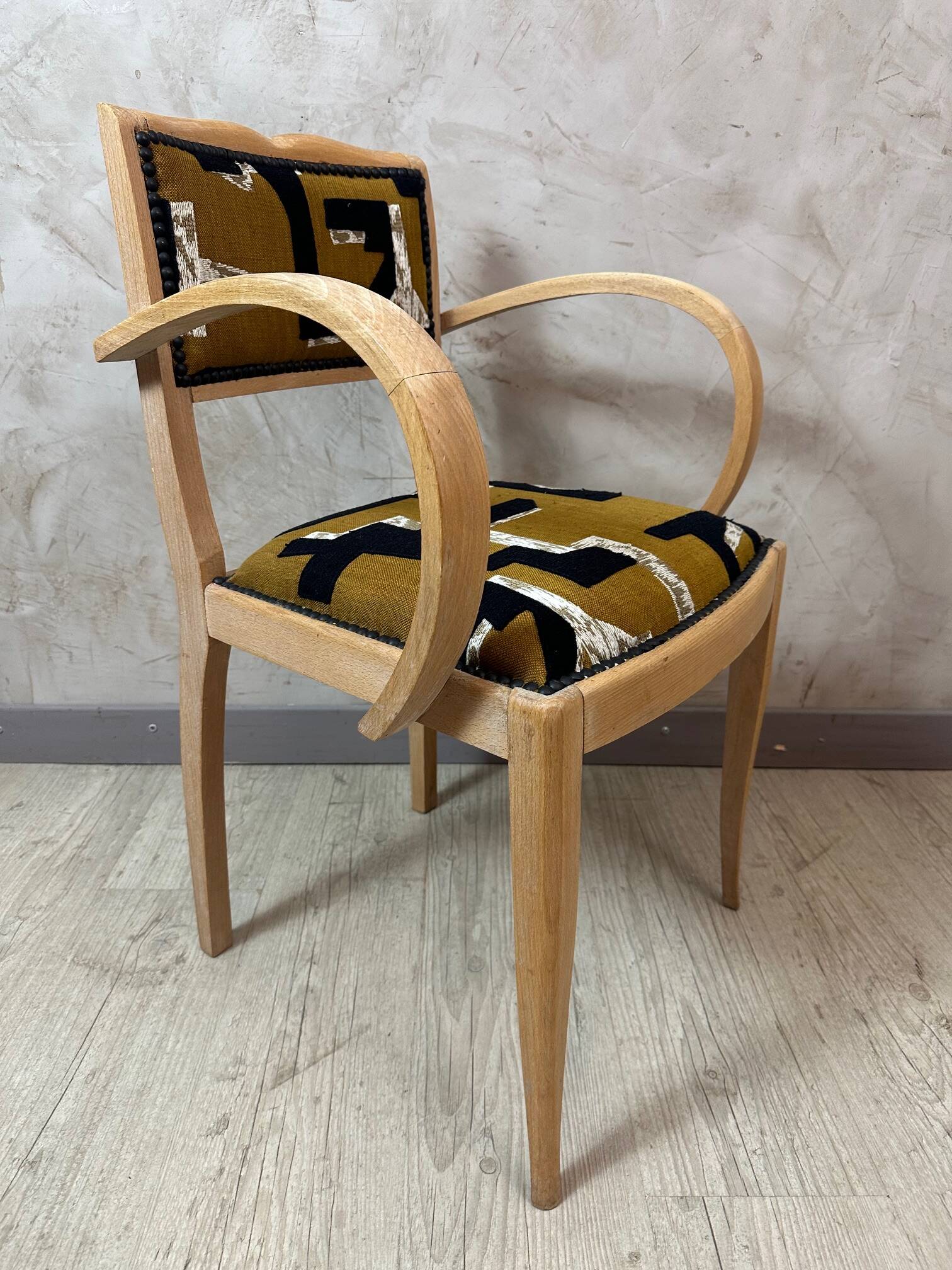 Fauteuil Bridge retapissé