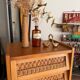 Vintage 1960s chest of drawers / chiffonnier with tapered legs and rattan.