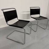 Lot of 4 tubular chairs designed by Mart Stam in vintage black leather from the 1980s.