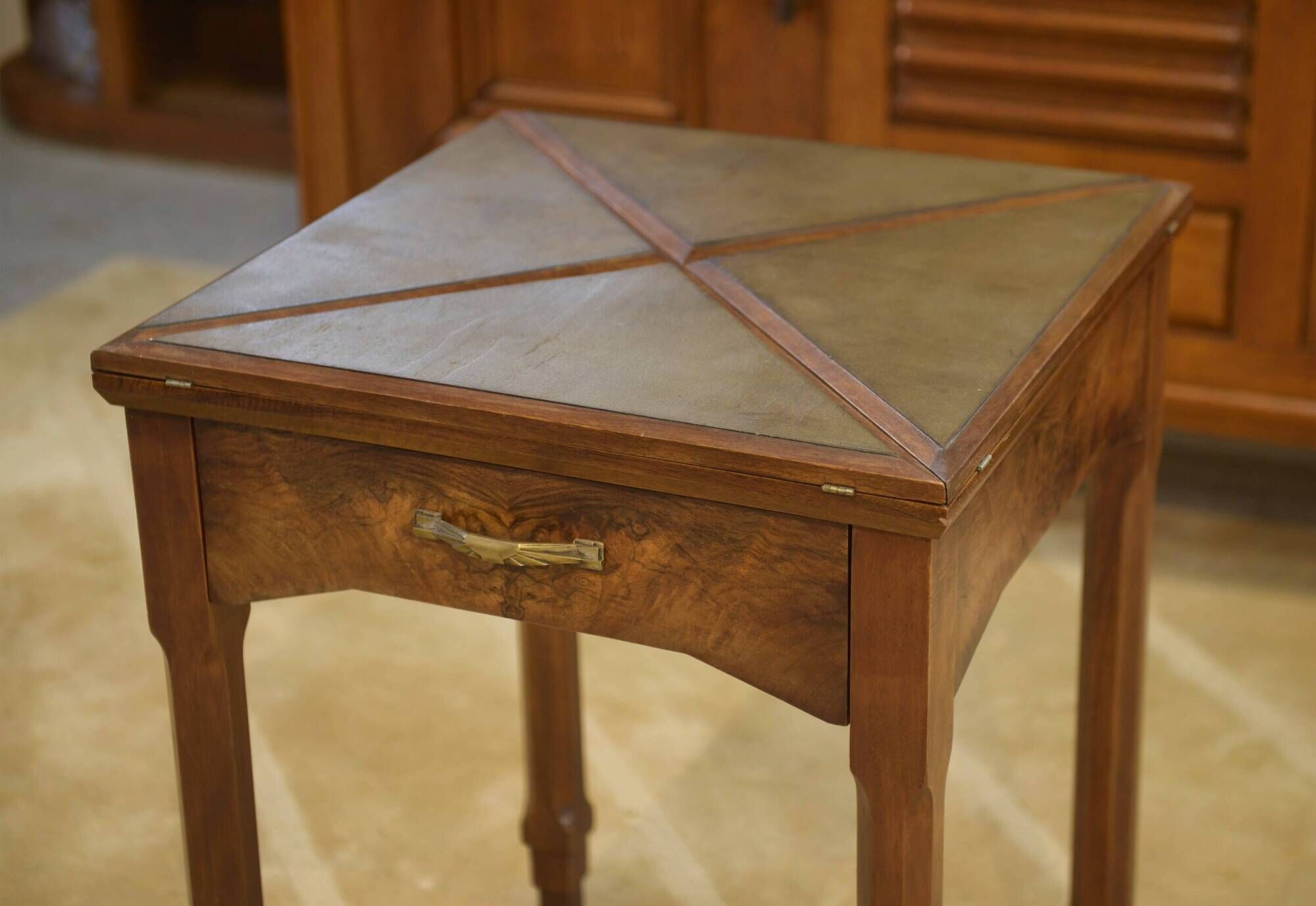 Art Deco game table in walnut from the 1930s.