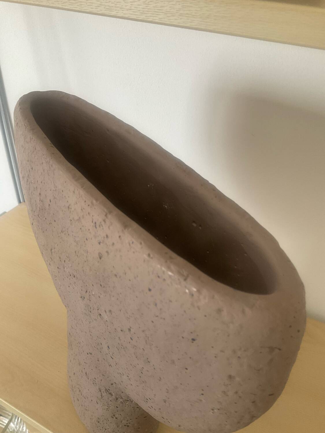 Vintage vase made of raw clay