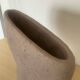 Vintage vase made of raw clay