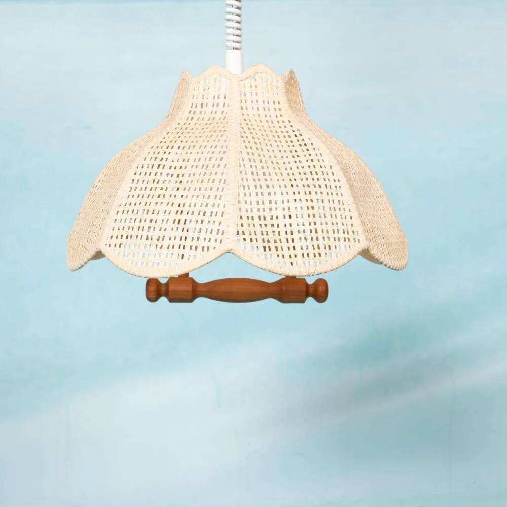 Swedish suspended lamp in bohemian strap.