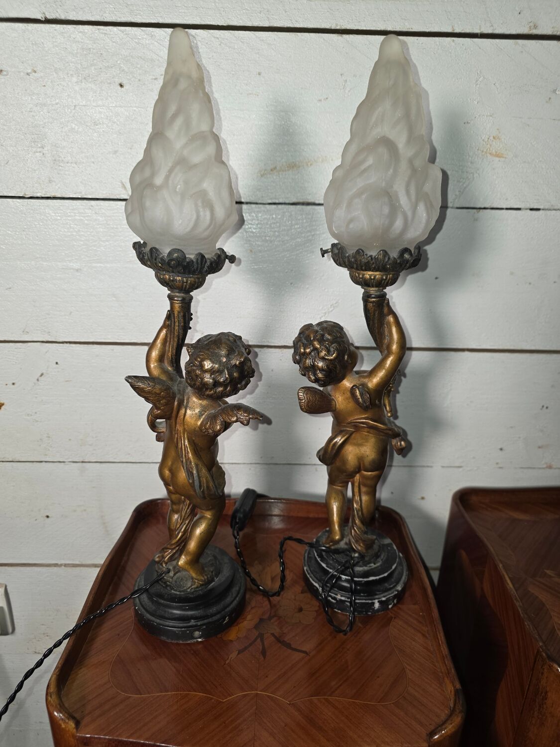 Pair of putti angel lamps from the 19th century.