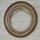 Round gilded wooden frame