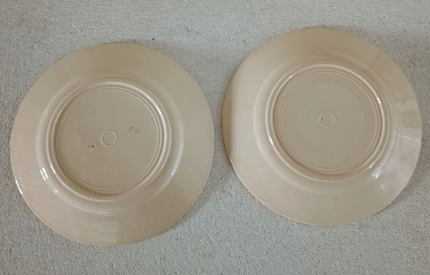 Two iron earth plates decorated with rose