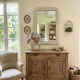 Antique Louis-Philippe mirror with pearls and shells, white patina.