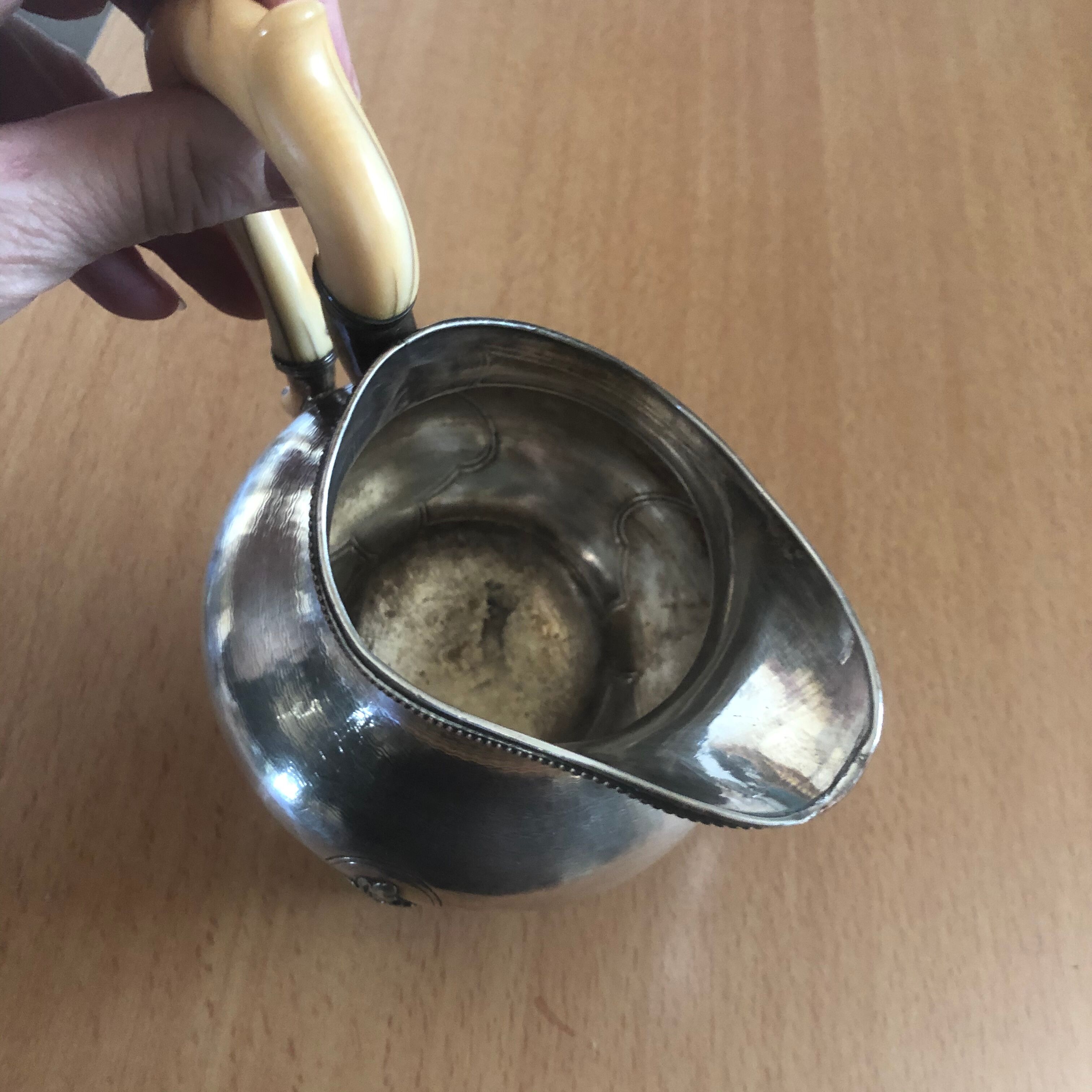Silver metal milk pot