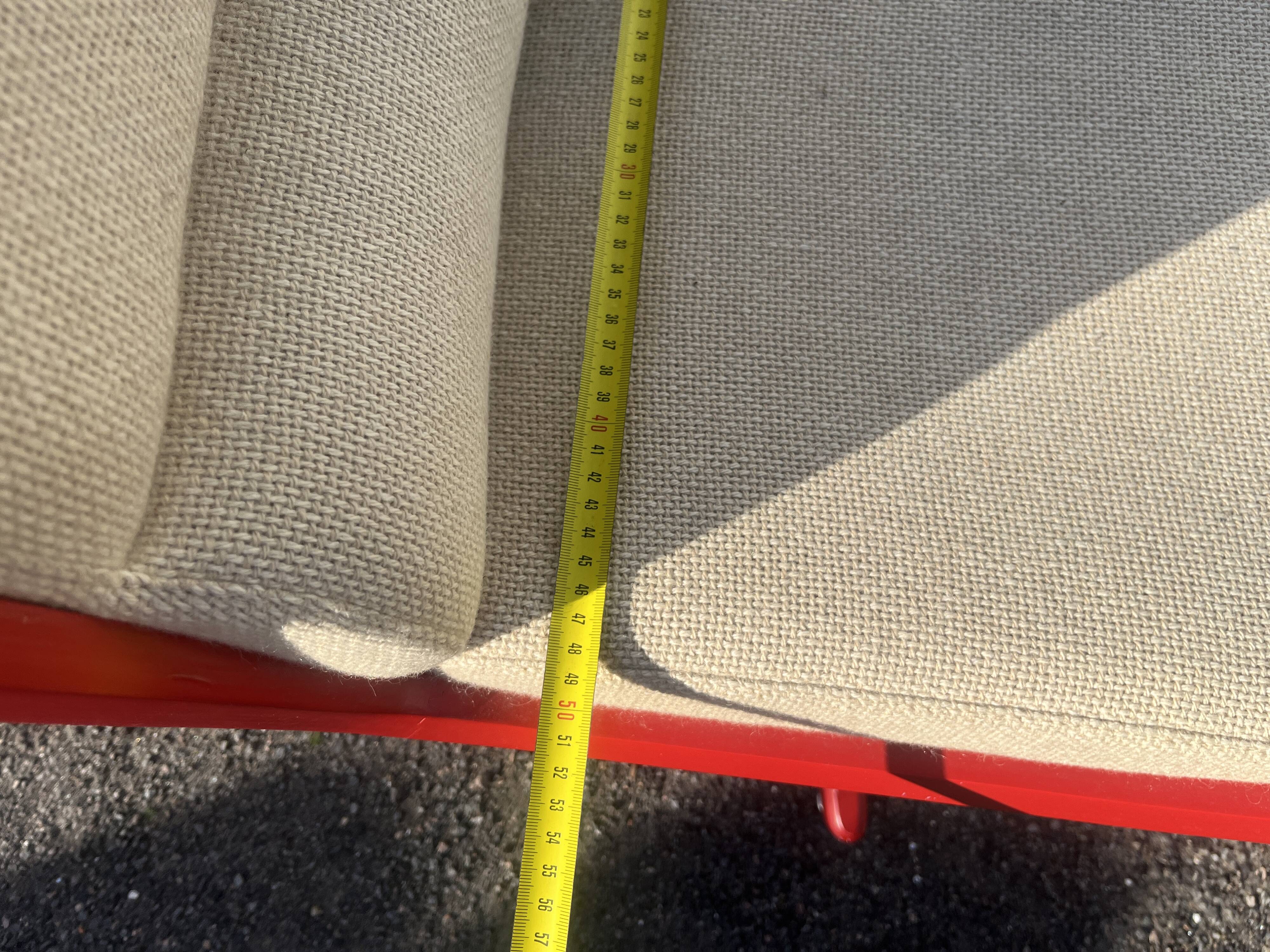 Set of 4 vintage 1970s swivel chairs in red and beige.