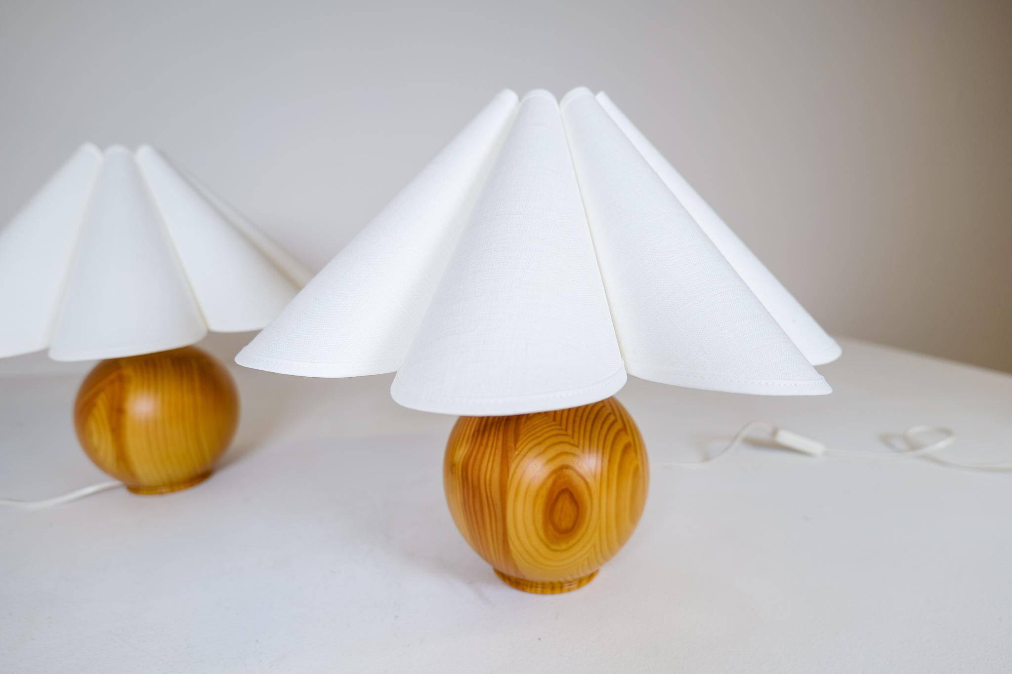 Sculptural modern table lamps from the mid-century in solid pine, Sweden, 1970s.