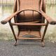 Arts & Crafts armchair in wicker and rattan attributed to Dryad & Co, UK, circa 1920.
