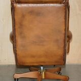 Captain's chair Chesterfield vintage leather with tufted wingback.