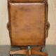 Captain's chair Chesterfield vintage leather with tufted wingback.