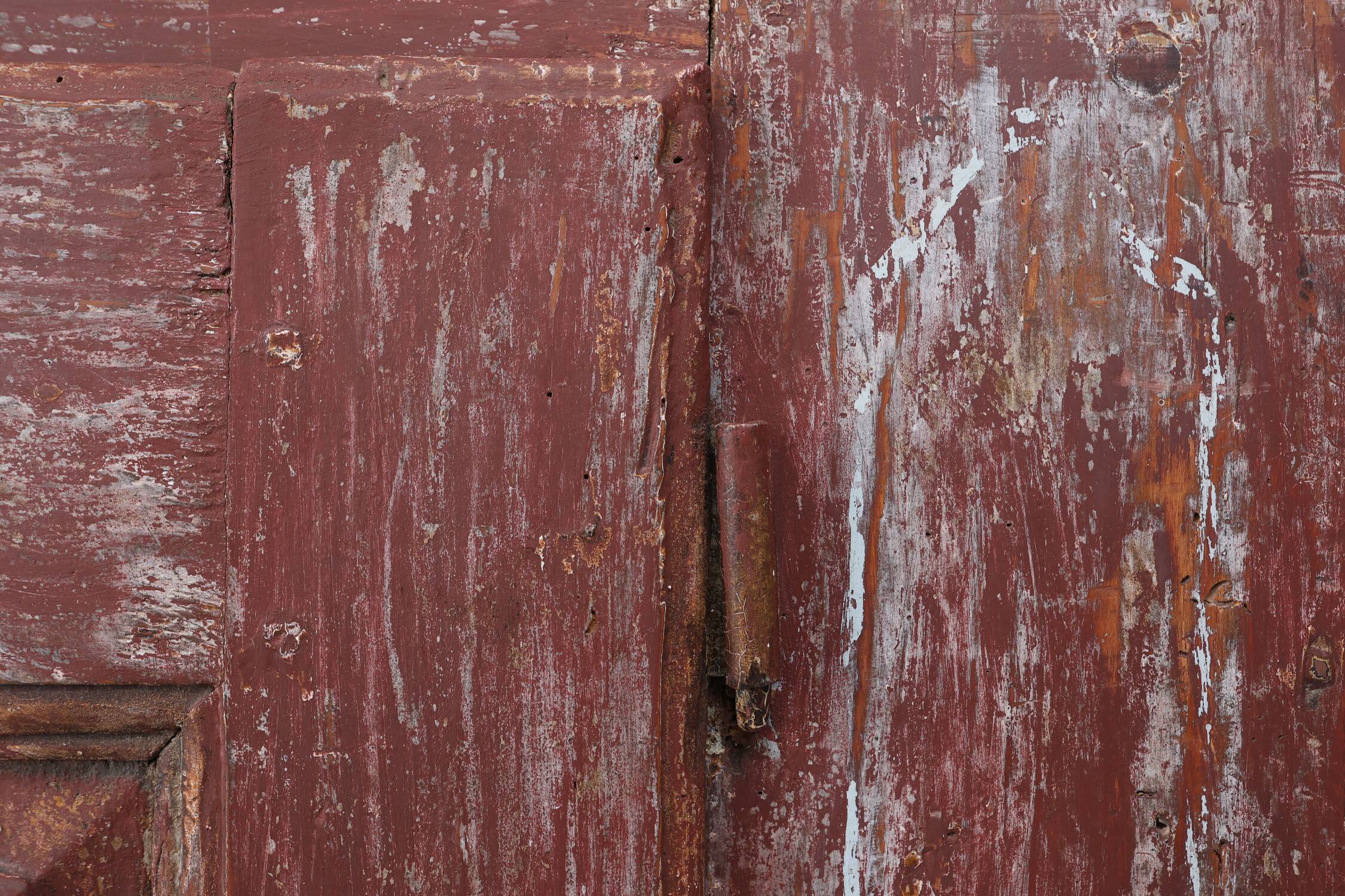 Rustic Parisian cabinet in pine wood with old burgundy paint layers, ca. 18