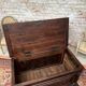 Chest in carved natural wood of the eighteenth century