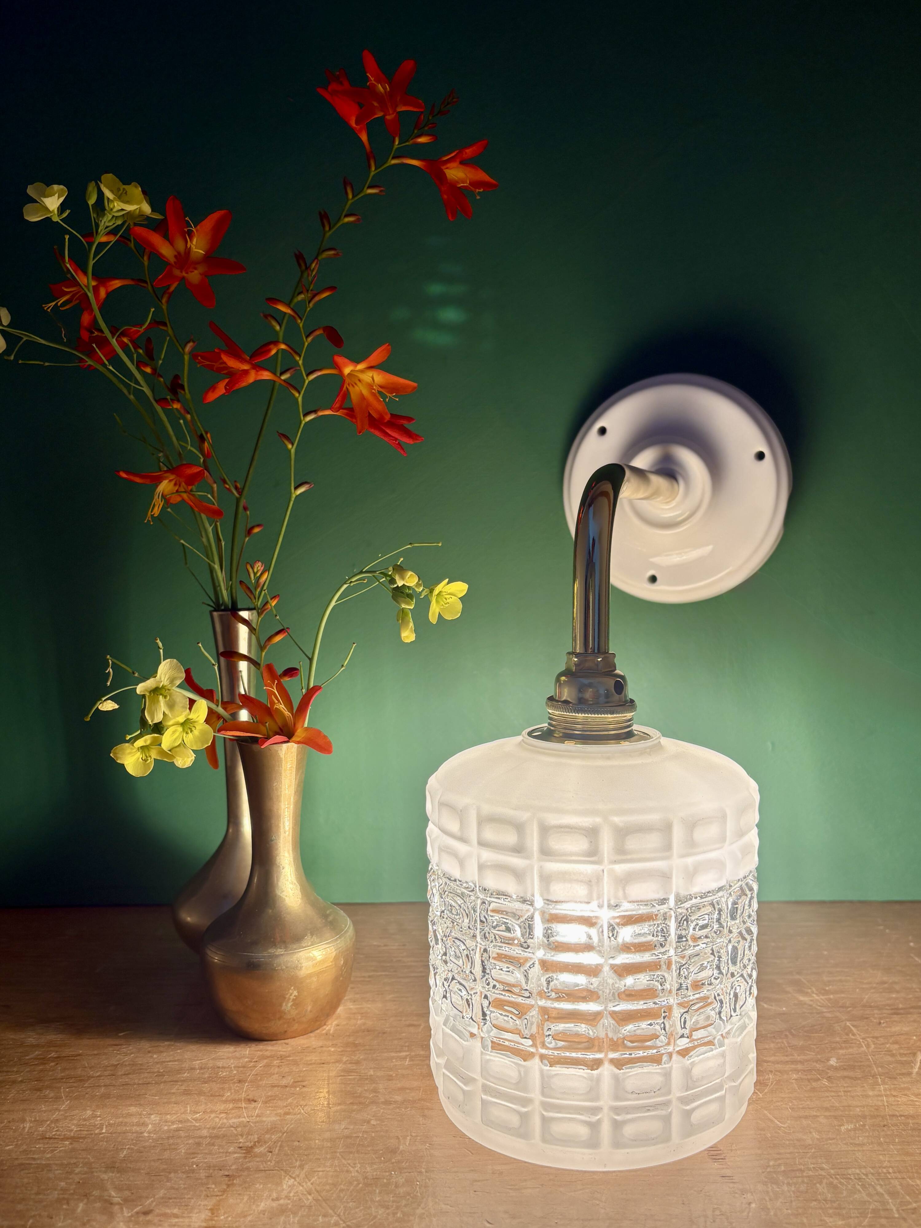 Vintage globe angled wall light in white and clear glass