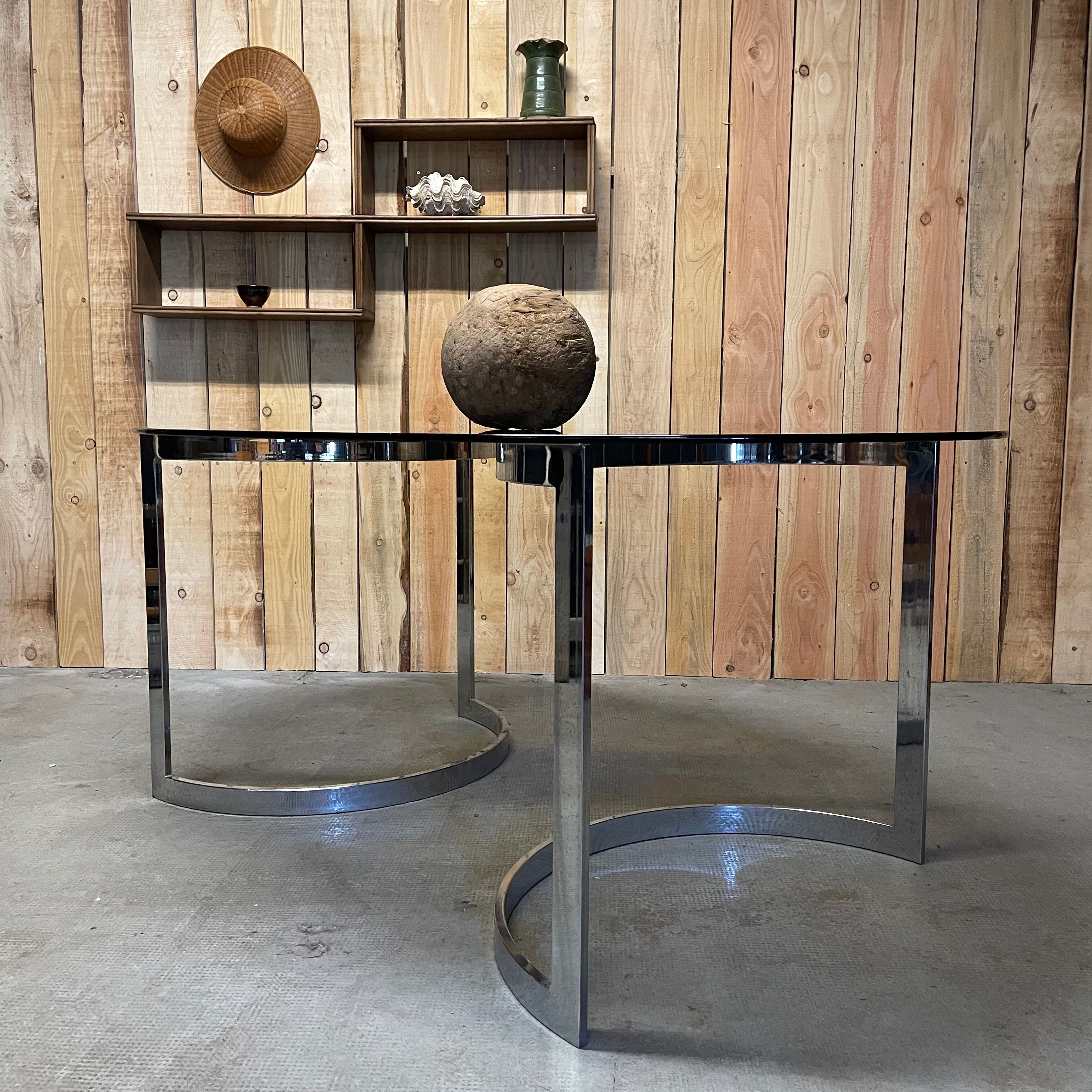 Glass oval dining table by Milo Baughman