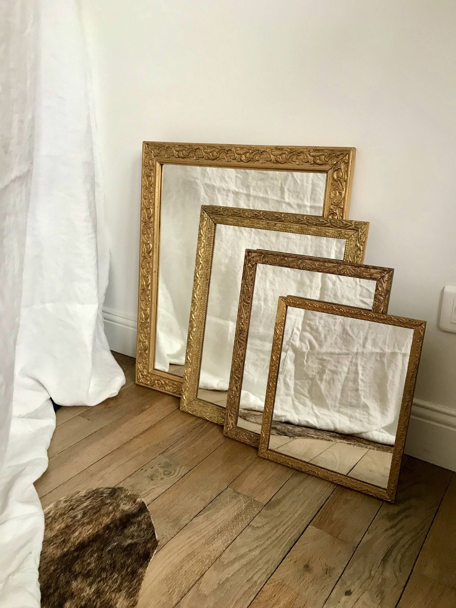 set of 4 mirrors in wood and gilded stucco early 20th century