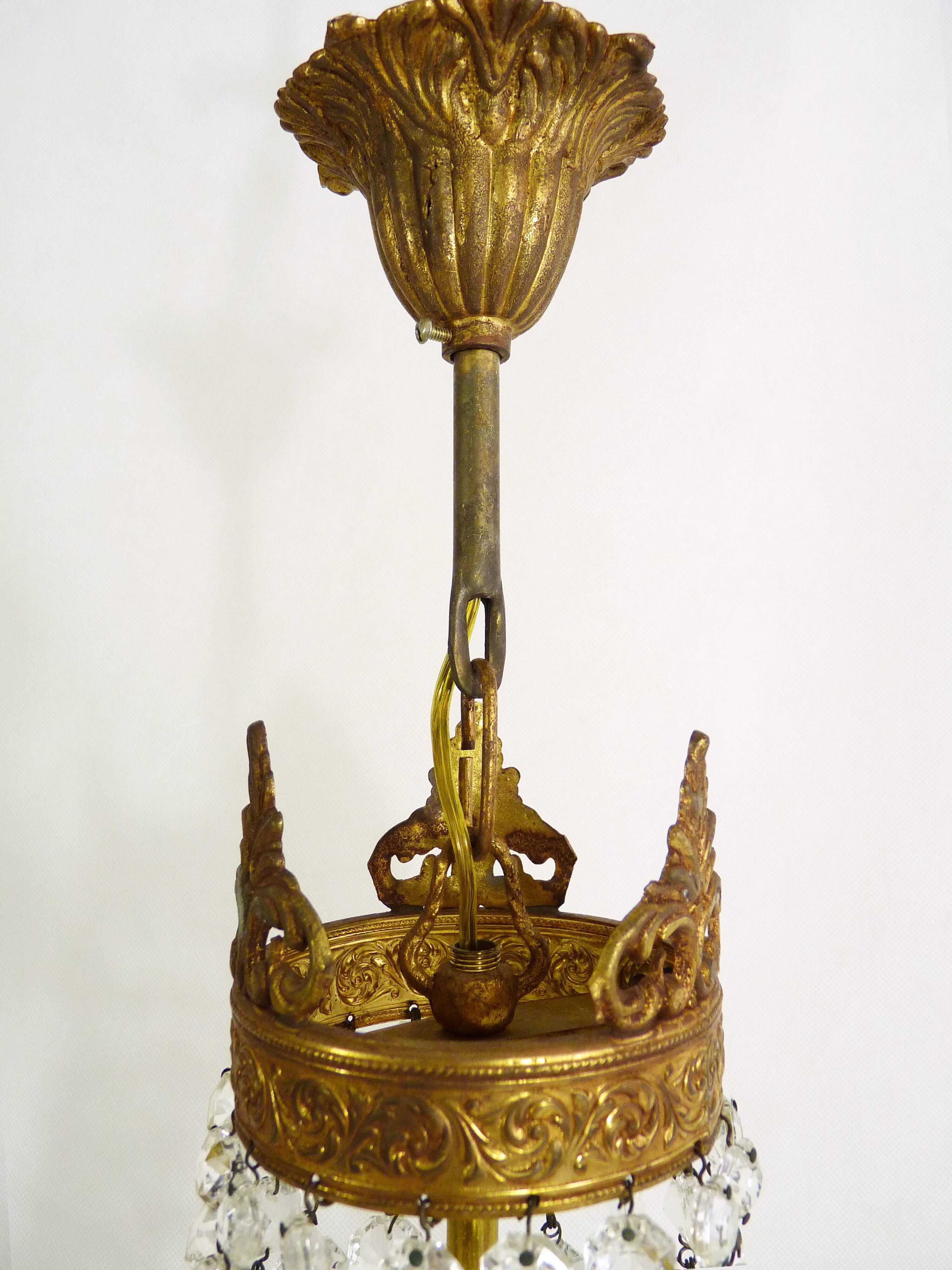 Former 2-light bronze hot air balloon chandelier, glass stamps. Year 50