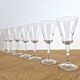 7 crystal footed glasses, antique white wine glasses.