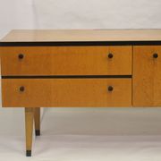 Black-gloved 50s varnished wooden sideboard