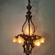 LOUIS XV style chandelier in gilded and patinated bronze with draped women
