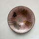 Brass bowl with hand-painted floral decoration, bohemian style.