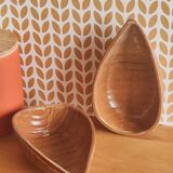 Glazed stoneware bowls for aperitifs or as catchalls in the shape of a walnut, signed.