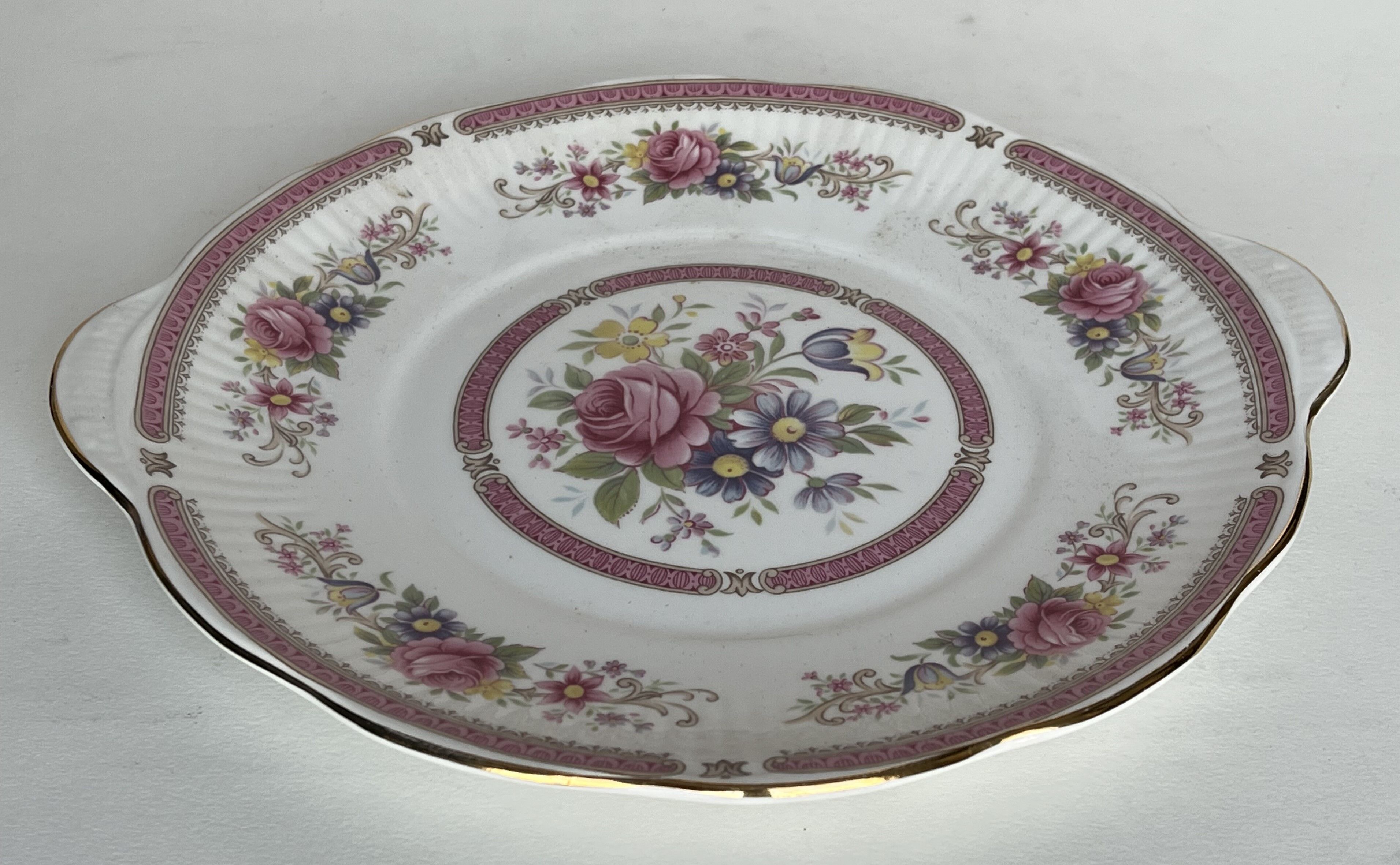 10 porcelain plates and a dish