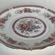 10 porcelain plates and a dish