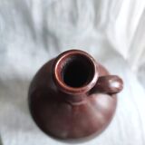 Large burgundy jar