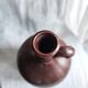 Large burgundy jar