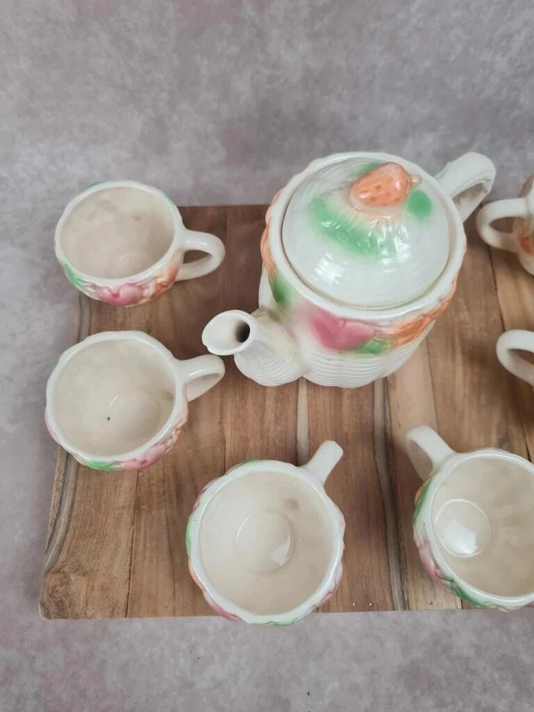 Adorable little vintage tea set in coloured earthenware.