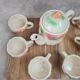 Adorable little vintage tea set in coloured earthenware.