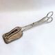 Wrought silver plated cake clips