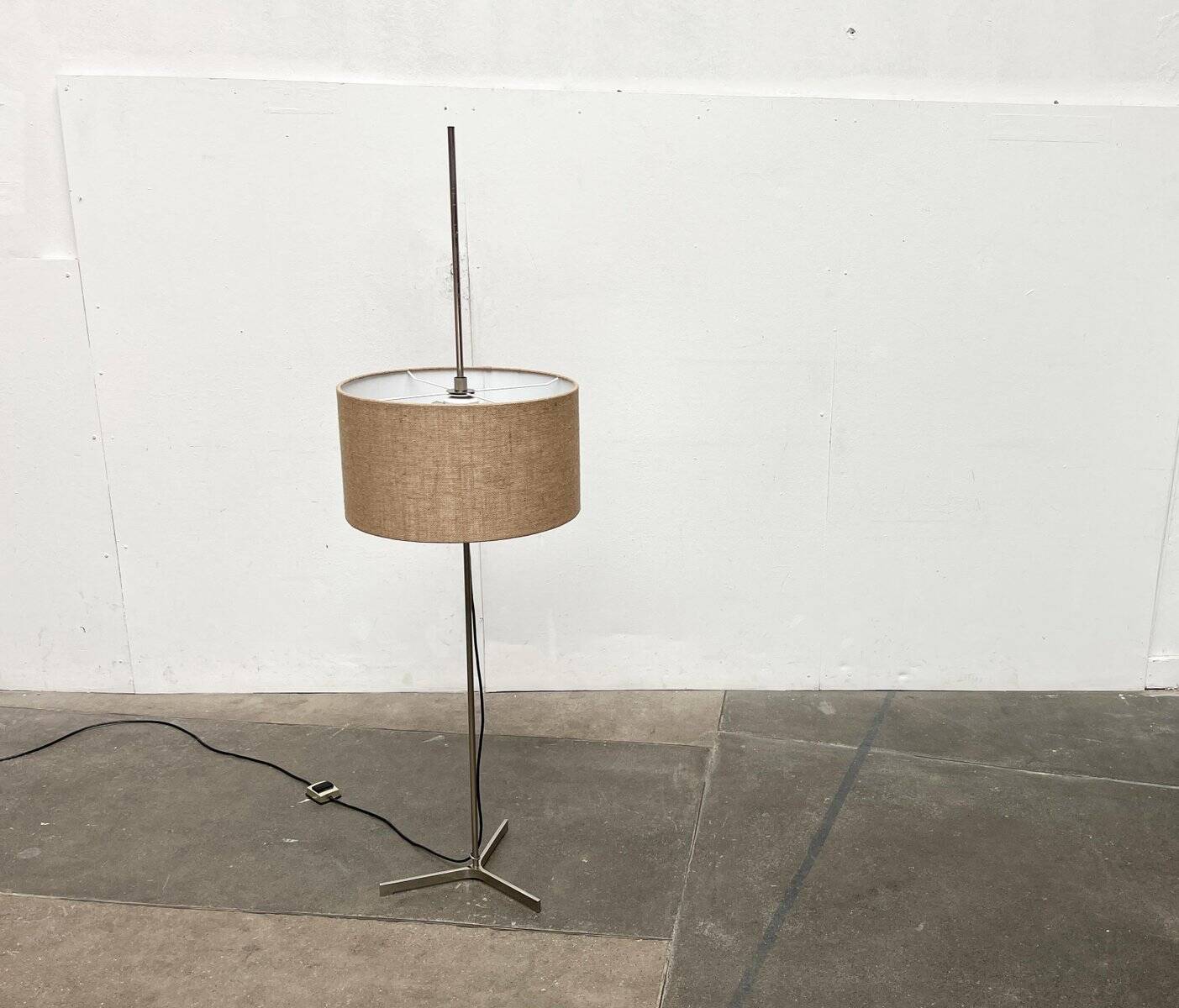 Minimalist German tripod floor lamp from the mid-century, 1960s.