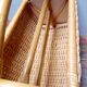 Antique rattan magazine rack