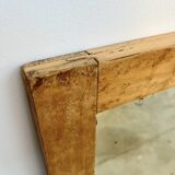 Antique mirror on an elm wardrobe door