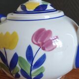 Antique teapot with flower pattern