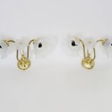 Pair of vintage brass wall lights with flower and glass tulip. 80 years