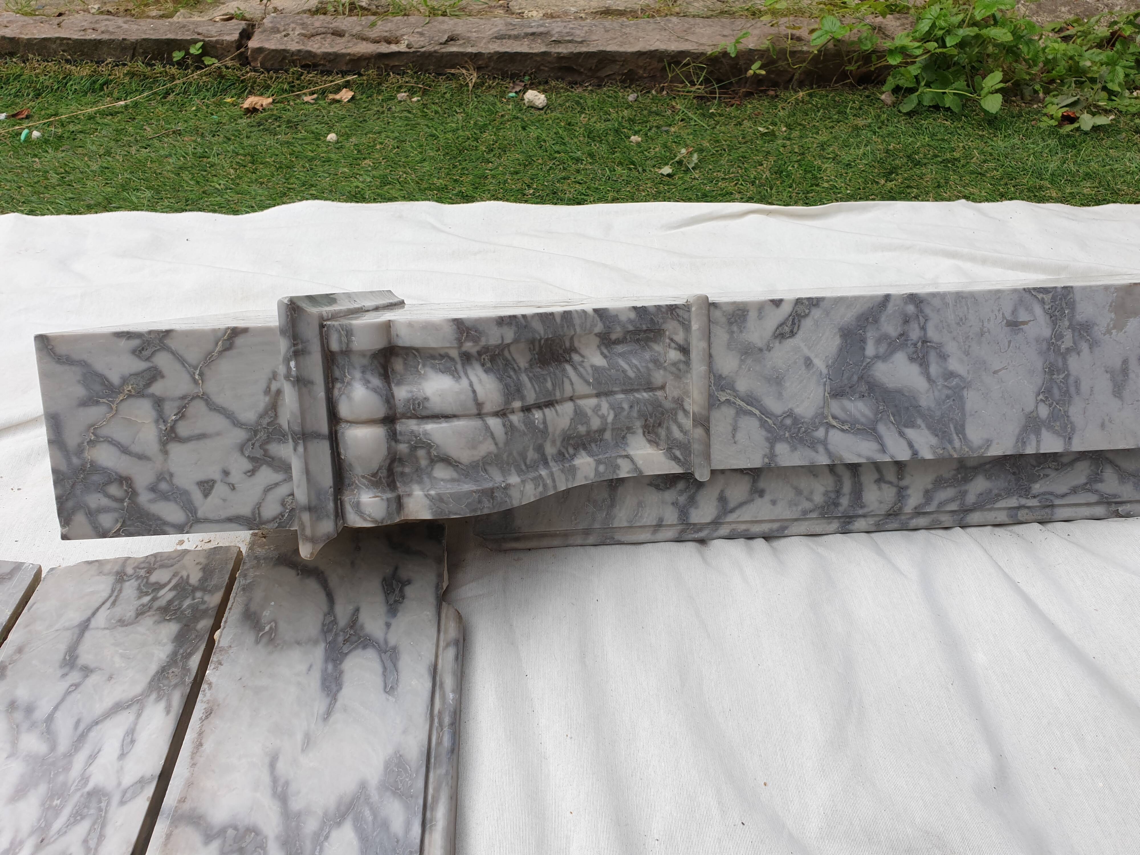 Fireplace modillon Napoleon III in gray marble of the nineteenth