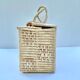 Valise vintage en fibres naturelles