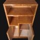 Art Deco cabinet in speckled maple veneer with asymmetrical shelves.