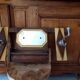 Vintage Art Deco wall coat rack in two-tone wood with engraved mirror.