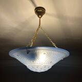 Blue pressed glass basin with Art Deco geometric patterns